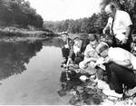 Students Collecting Specimens from Rocky River for Cleveland State University Pollution Control Seminar by Tom Prusha