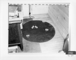 Defendant's Exhibit 076-34: Blood Spots Be hind Desk by Cleveland/Bay Village Police Department