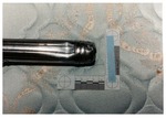 Model 18. Blow #2: metal flashlight with dent by Cuyahoga County Prosecutor's Office and Cuyahoga County Coroner's Office