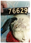 Model 28. Model head with channel lock pliers imprint by Cuyahoga County Prosecutor's Office and Cuyahoga County Coroner's Office