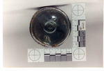 Weapon 20. Closeup of lens of metal flashlight by Cuyahoga County Prosecutor's Office and Cuyahoga County Coroner's Office