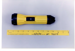 Weapon 40. Yellow plastic flashlight